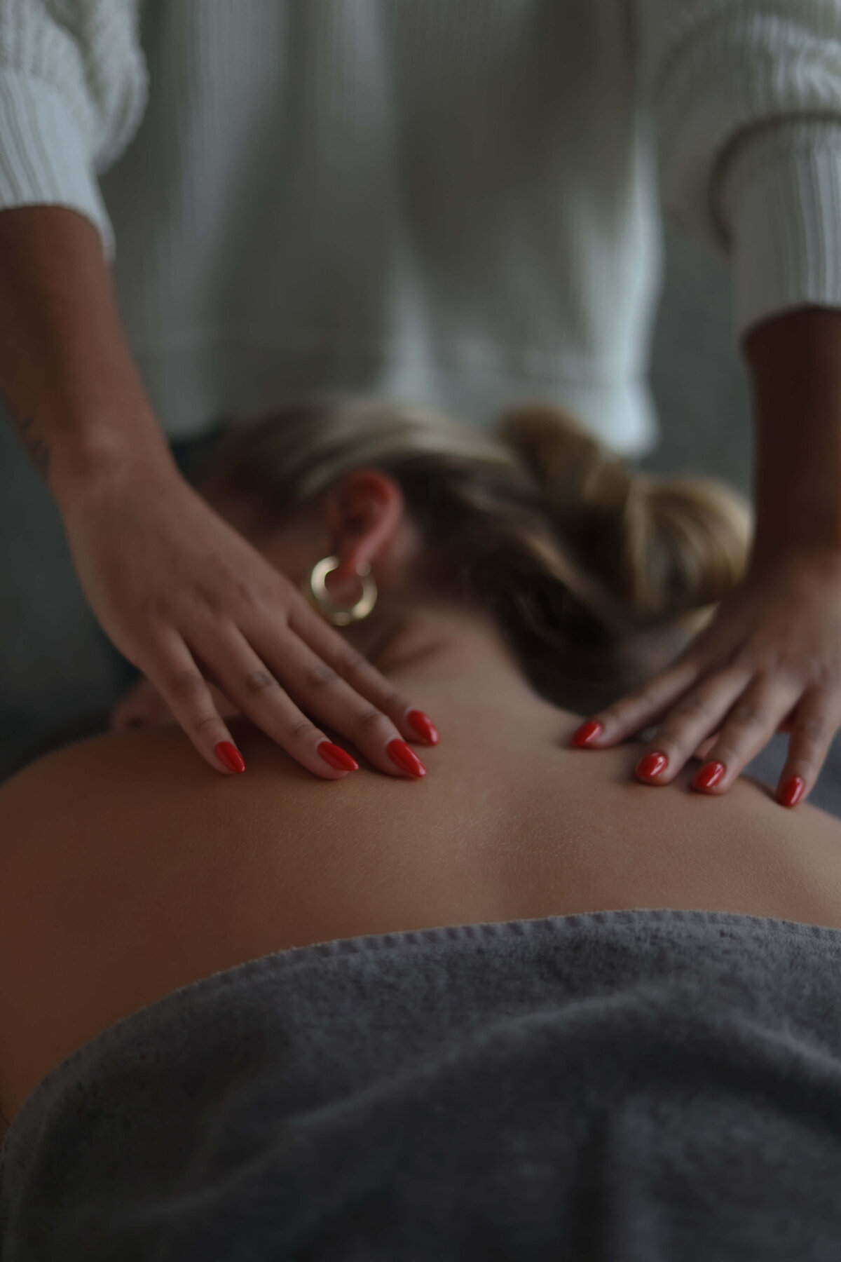 woman receiving massage at cedar rapids spa