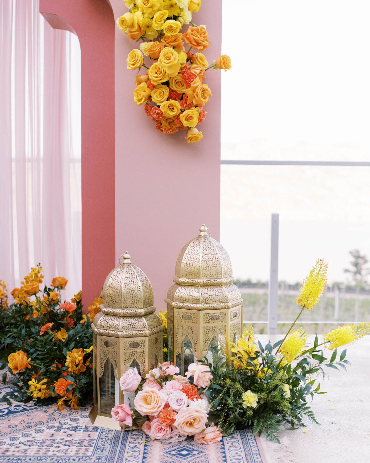 Pink moroccan themed ceremony decor, florals by Valley Bloom Co, bright and airy wedding florals based in Kelowna, BC. Featured on the Brontë Bride Vendor Guide.