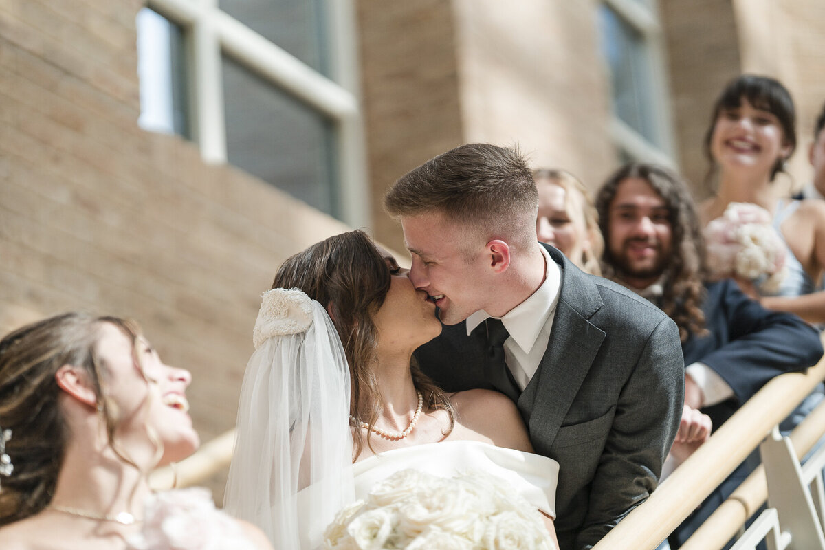 Bride and groom kissingWedding at the Fernbank Musum in Atlanta photographed by Ocala wedding photographers