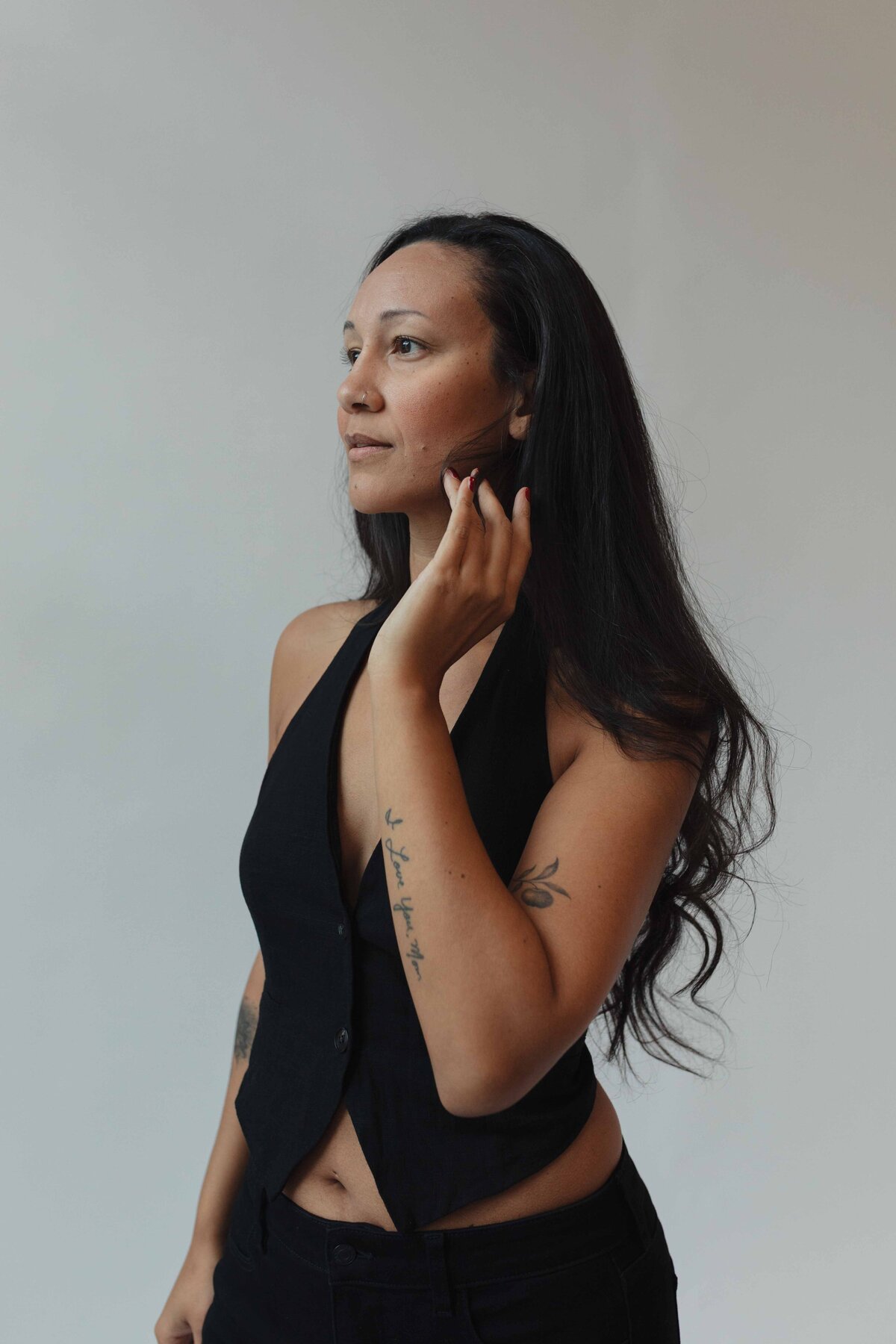 Studio portrait of a woman in soft natural light, captured by Portland portrait photographer Karen Pride.