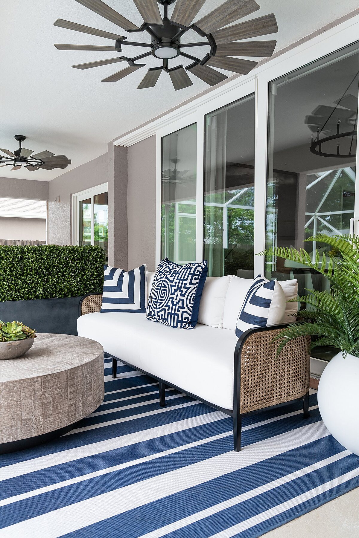 coastal luxury home nautical patio with navy accents full service interior design by Island Home Interiors Lake Nona