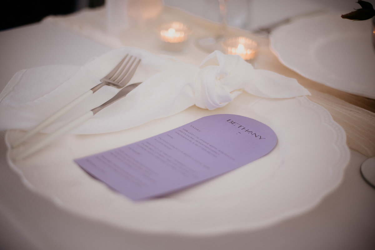 Lilac purple arched wedding reception menu with guest name