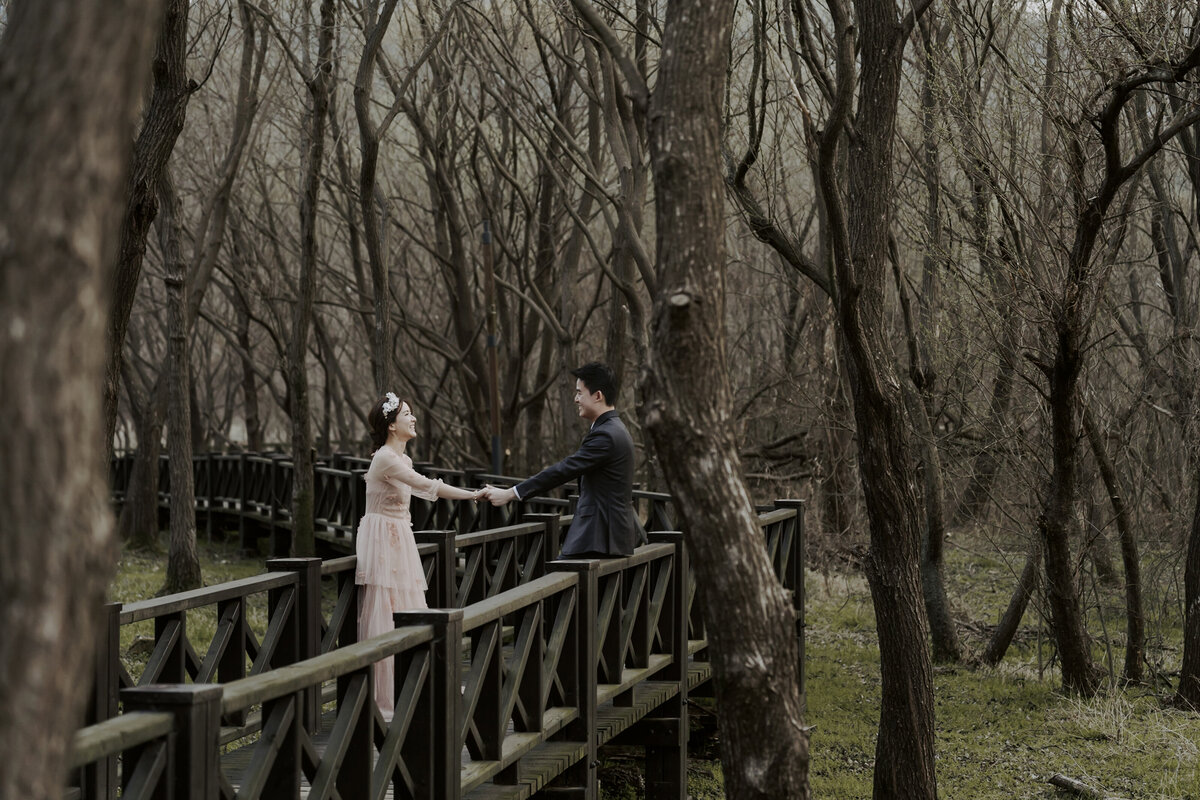 the couple is goofing around during their prewedding photoshoot