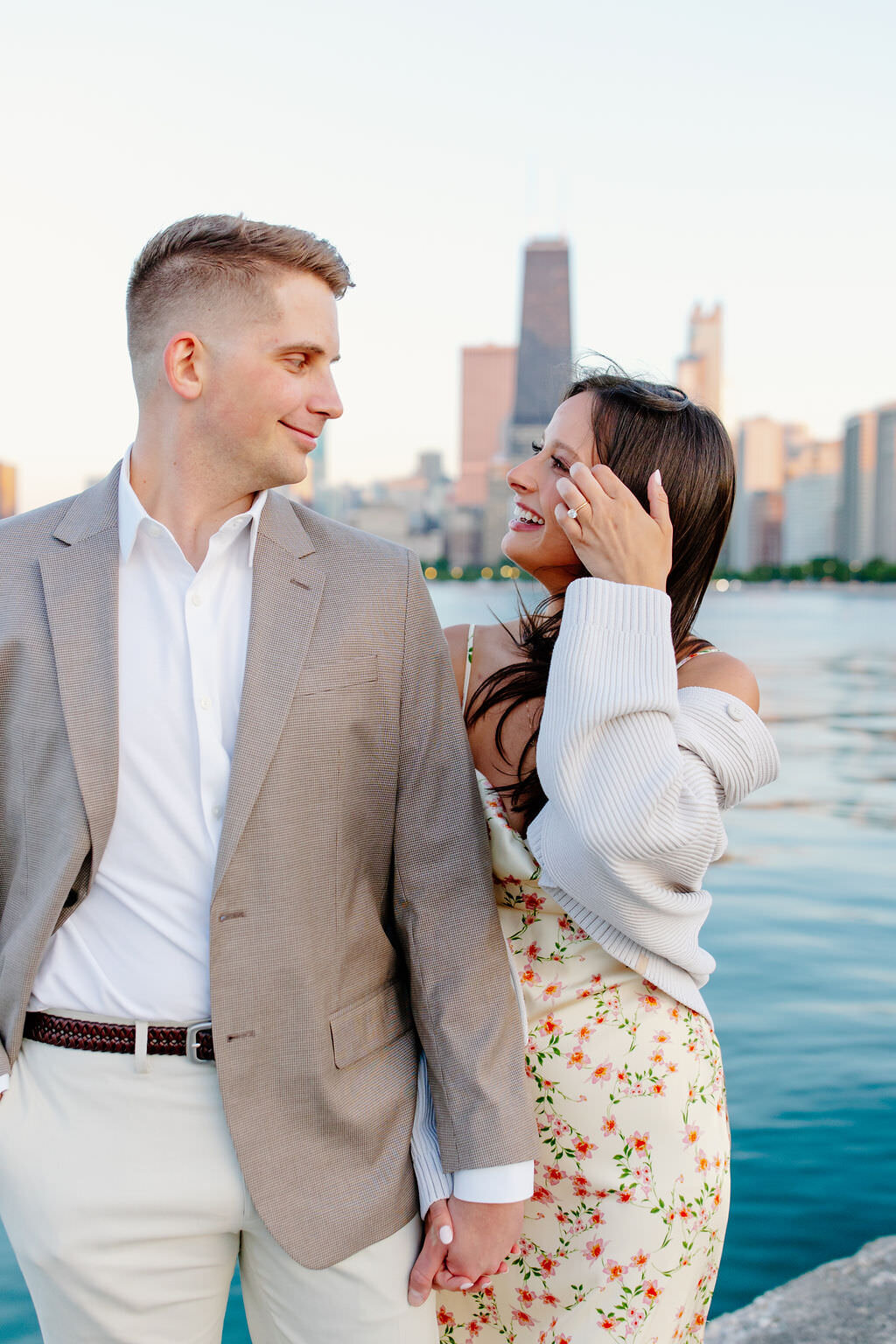 An engagement photography session at The Wrigley Building and North Ave Beach in Chicago, Illinois - 22