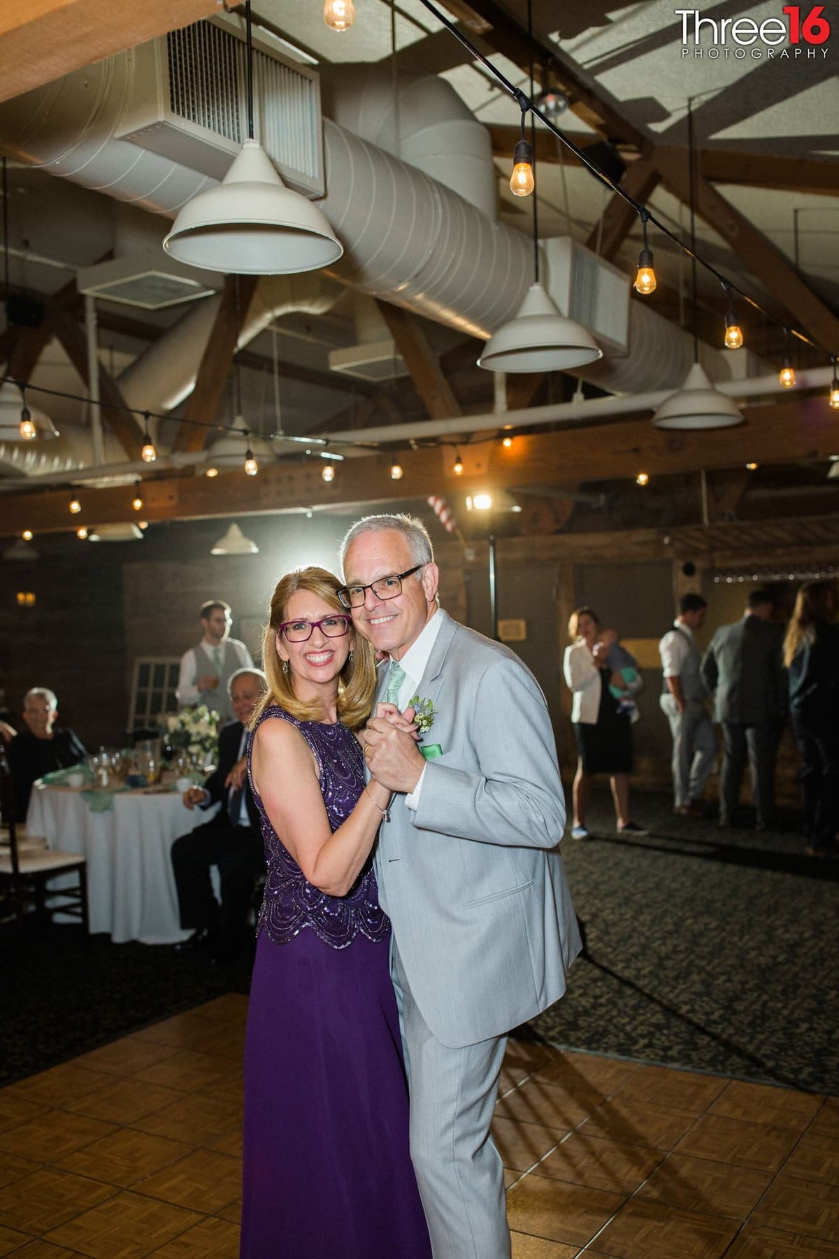Parents of the Bride dances at their daughter's wedding reception