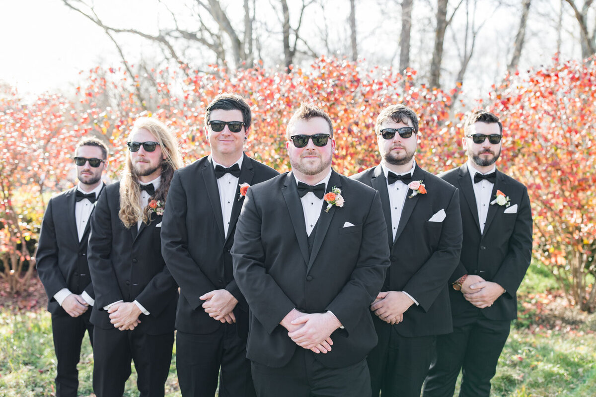 Groom and groomsmen with their matching black shades
