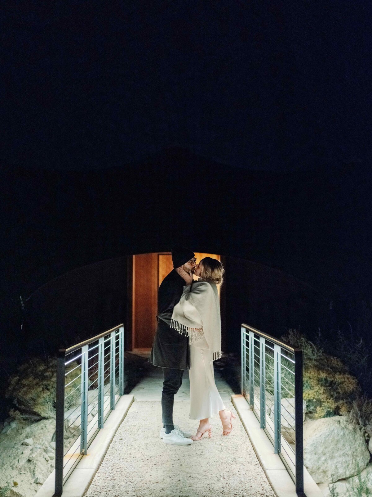 Amangiri Wedding Groom and Bride Kissing At Night
