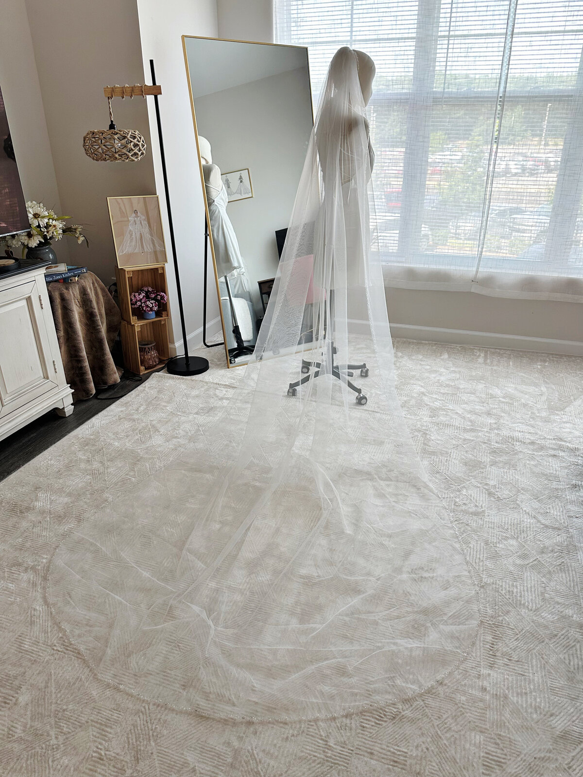 Romantic single-tier beaded veil flowing softly behind bride
