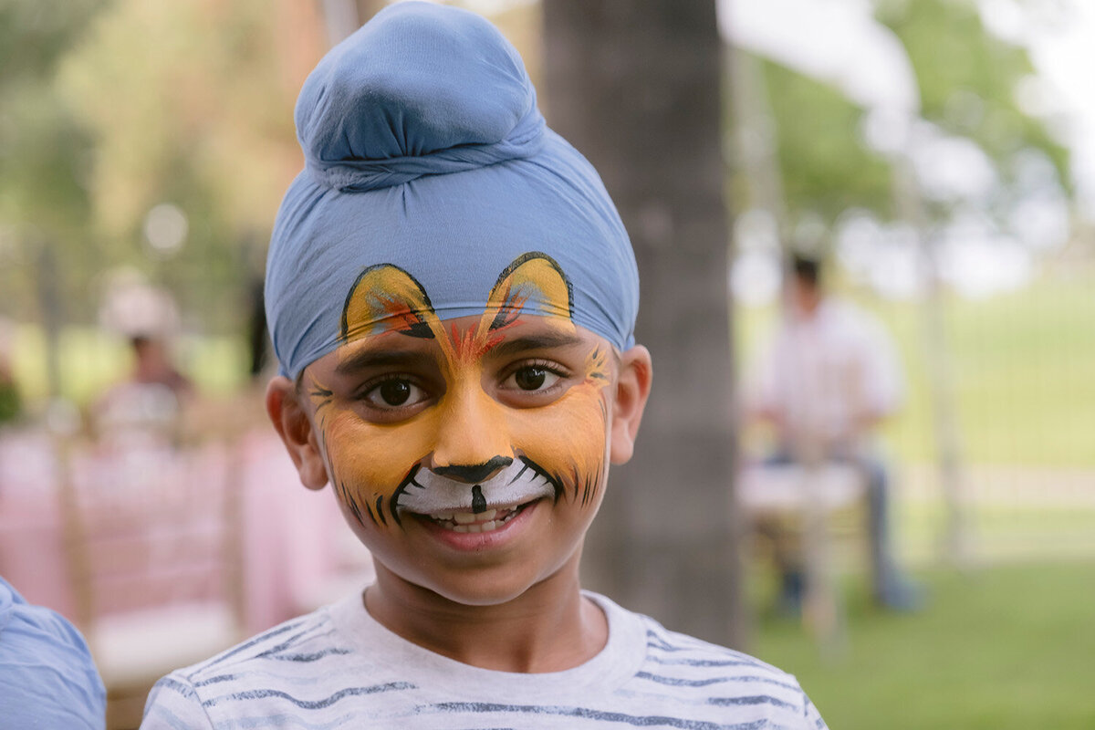 face-painted-boy-smiling-first-birthday-party-san-francisco
