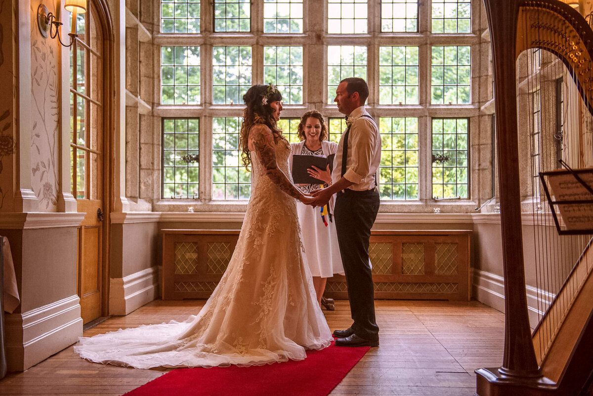5 bride-and-groom-at-ceremony-with-harp-cork