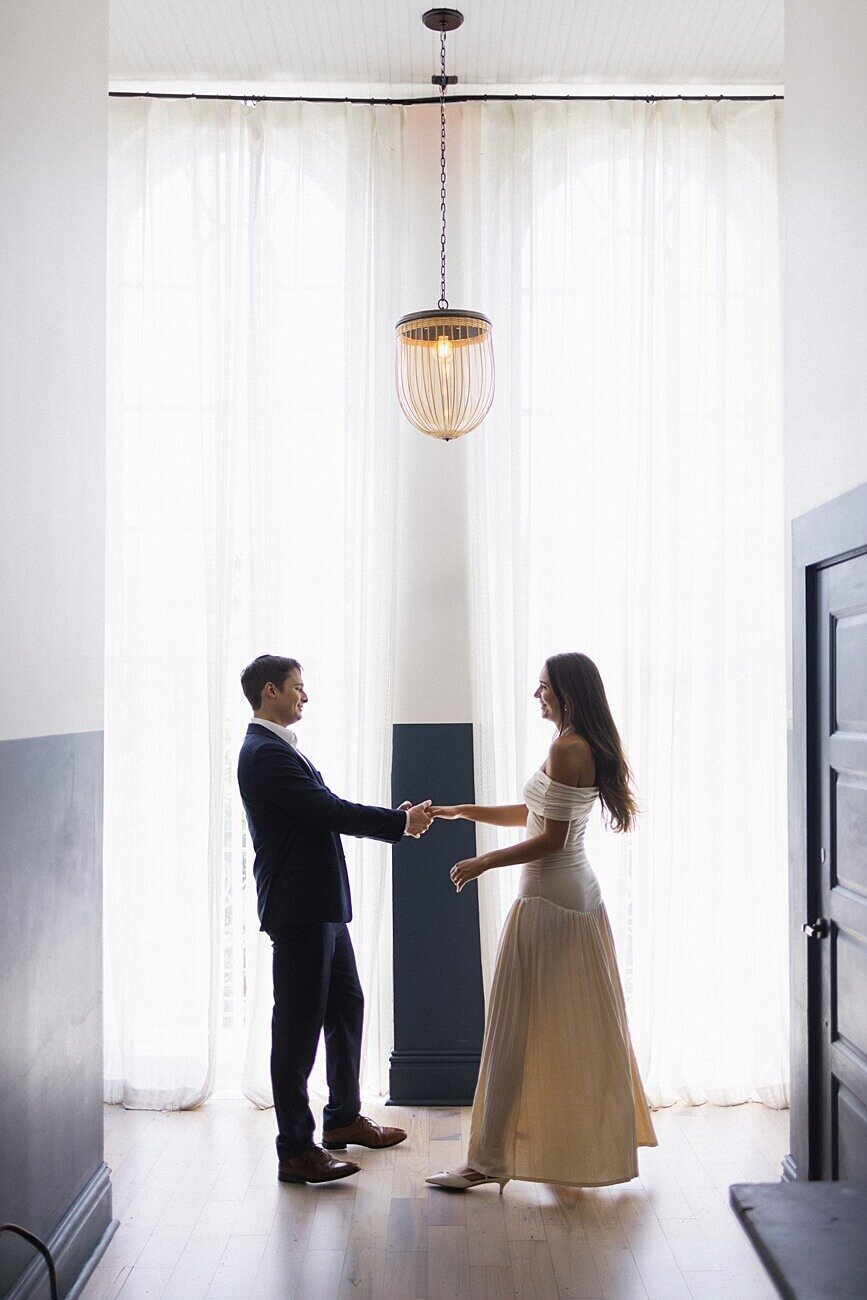 Couple dancing in hallway at Hotel Peter and Paul in New Orleans