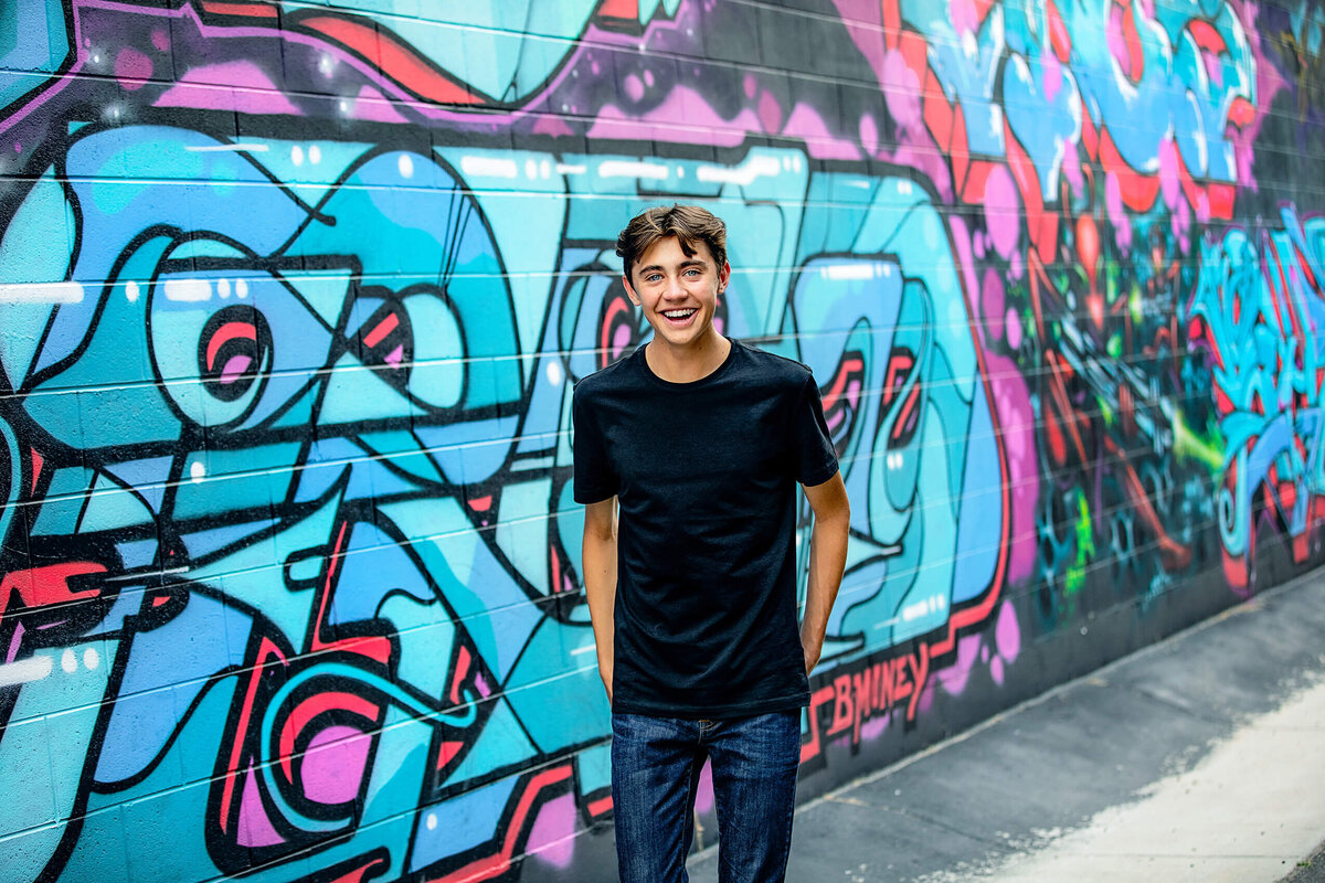 boy-high-school-senior-portrait-photography-graffiti-wall