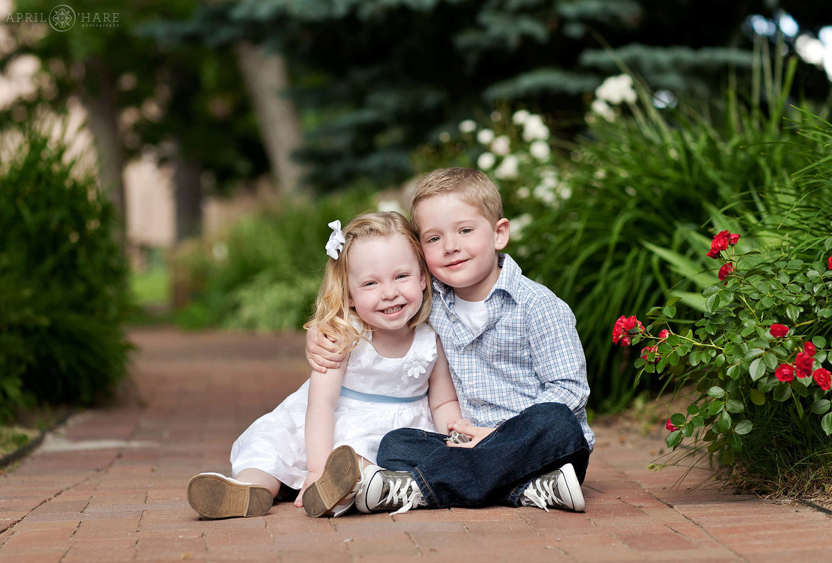 Sweet Sibling Family Photo in a garden at Chautauqua Park in Boulder Colorado