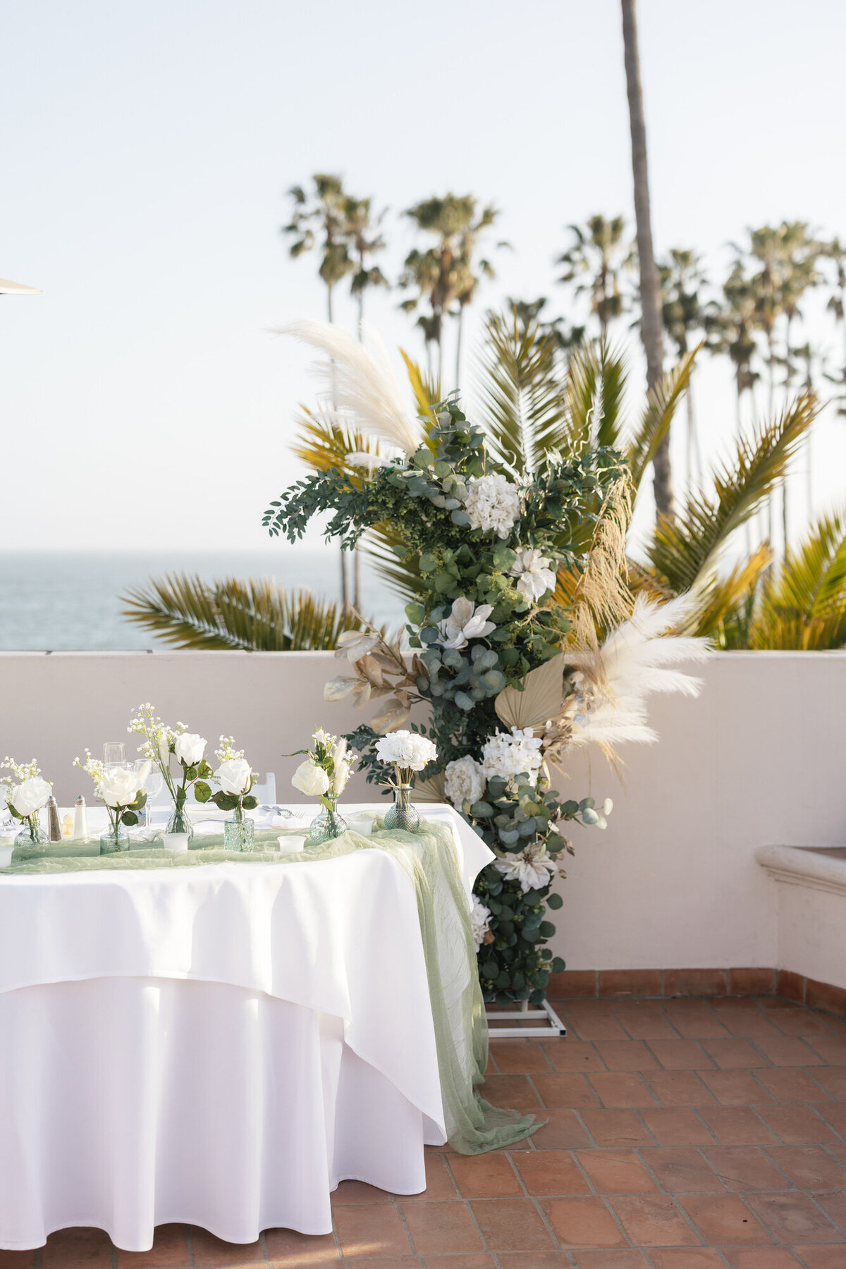 Head table details at Hilton Beachfront Resort Santa Barbara wedding in California