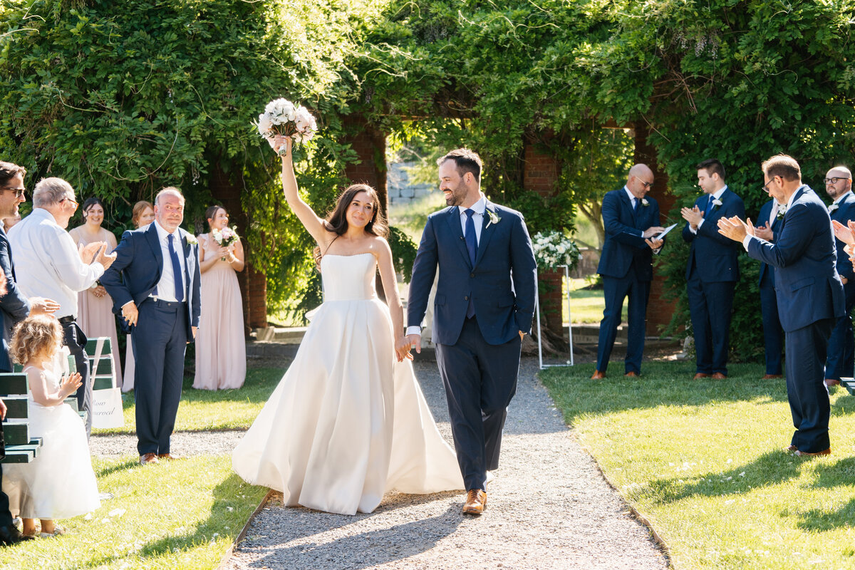 couple walking at wedding at turner hill in ipswich