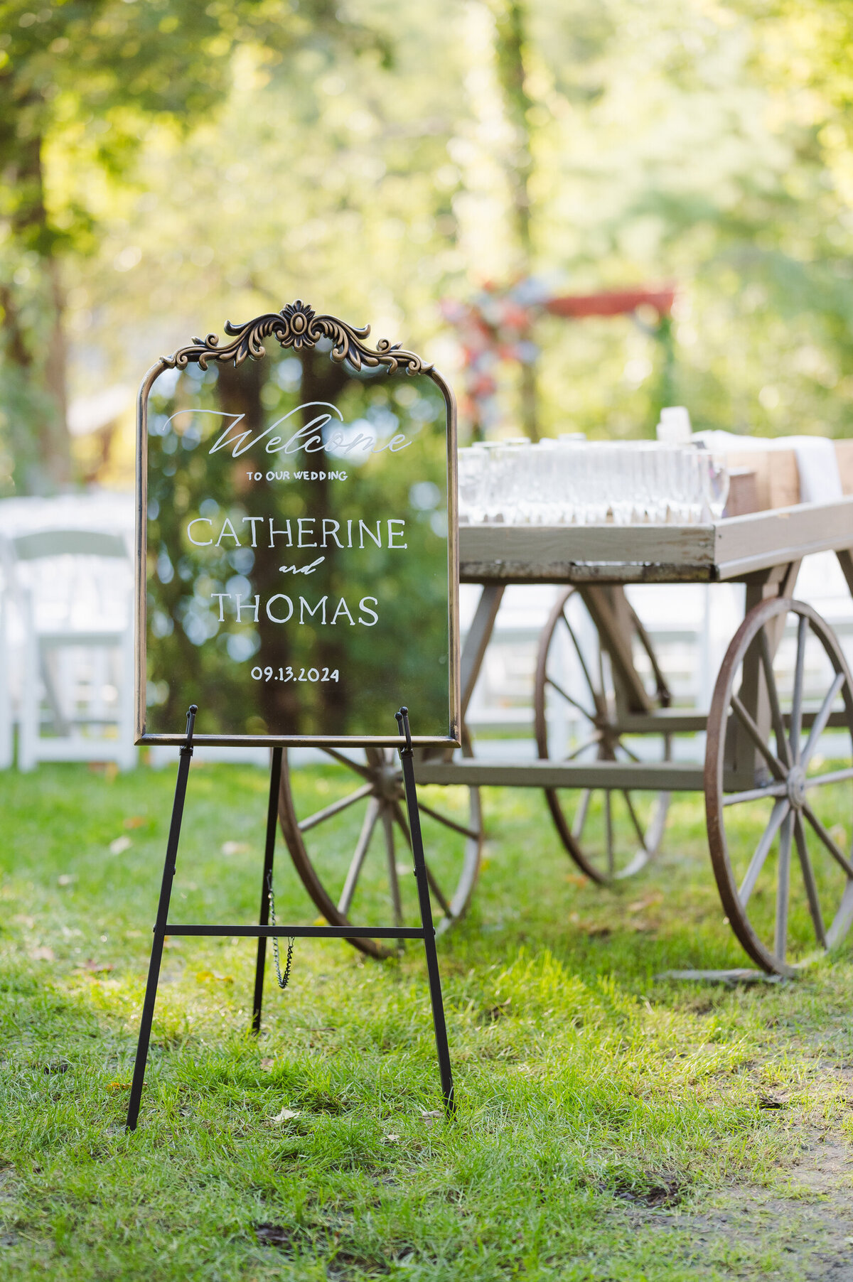mirror welcome sign at wedding