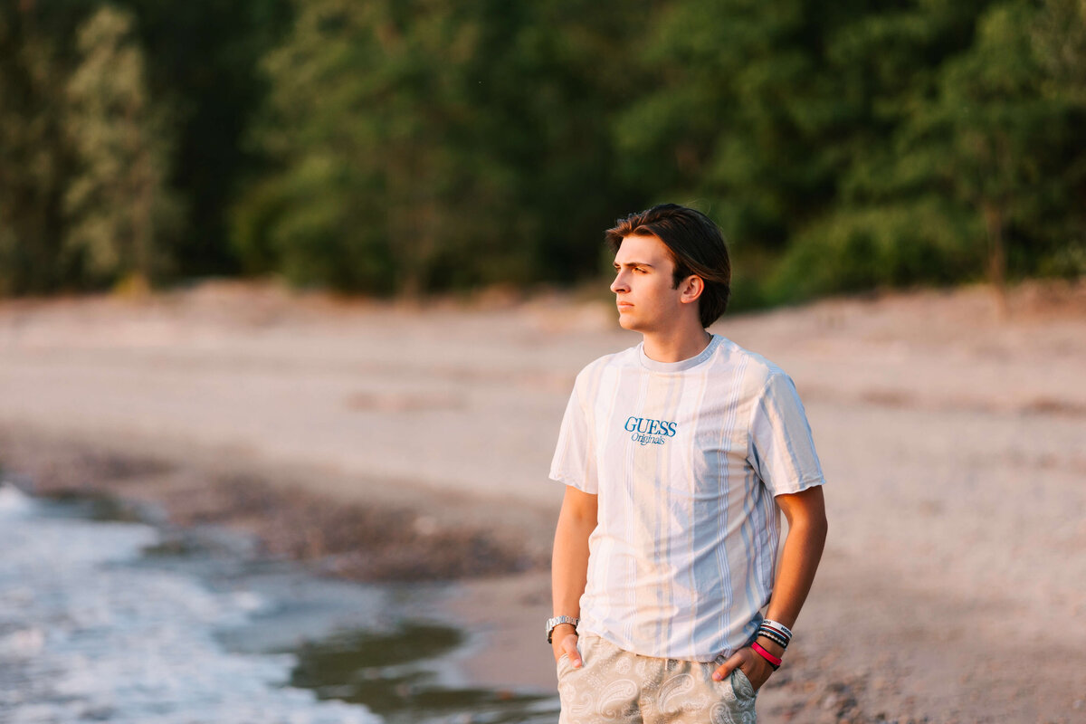 Erie Pa high school senior walking by the water at Presque Isle