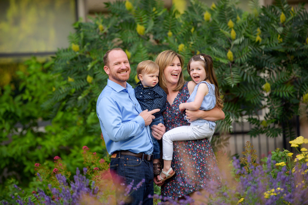 Family laughing and smiling during Boise portrait photoraphy with Tiffany Hix