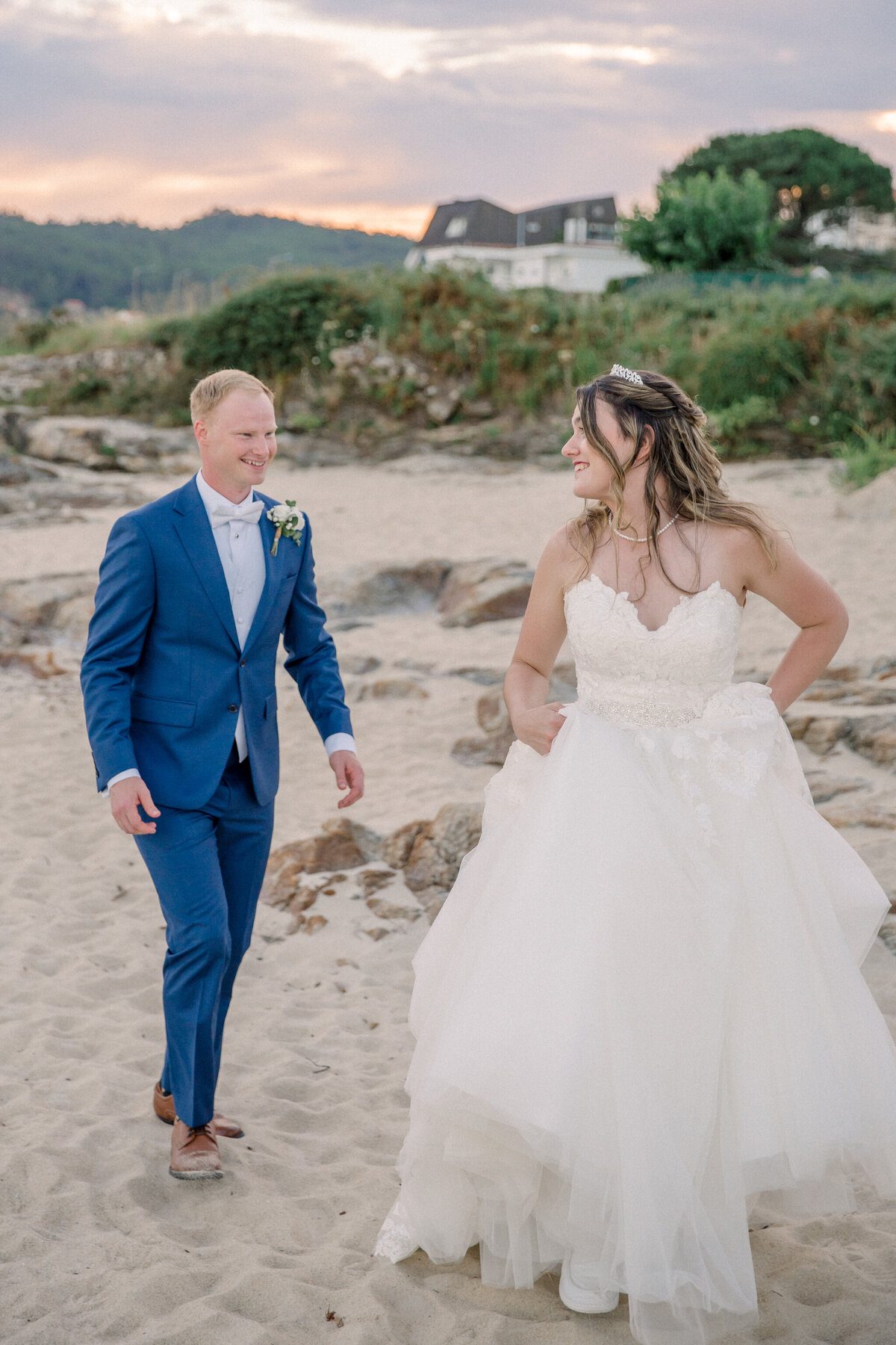 Spain Wedding | bride and groom run on the beach