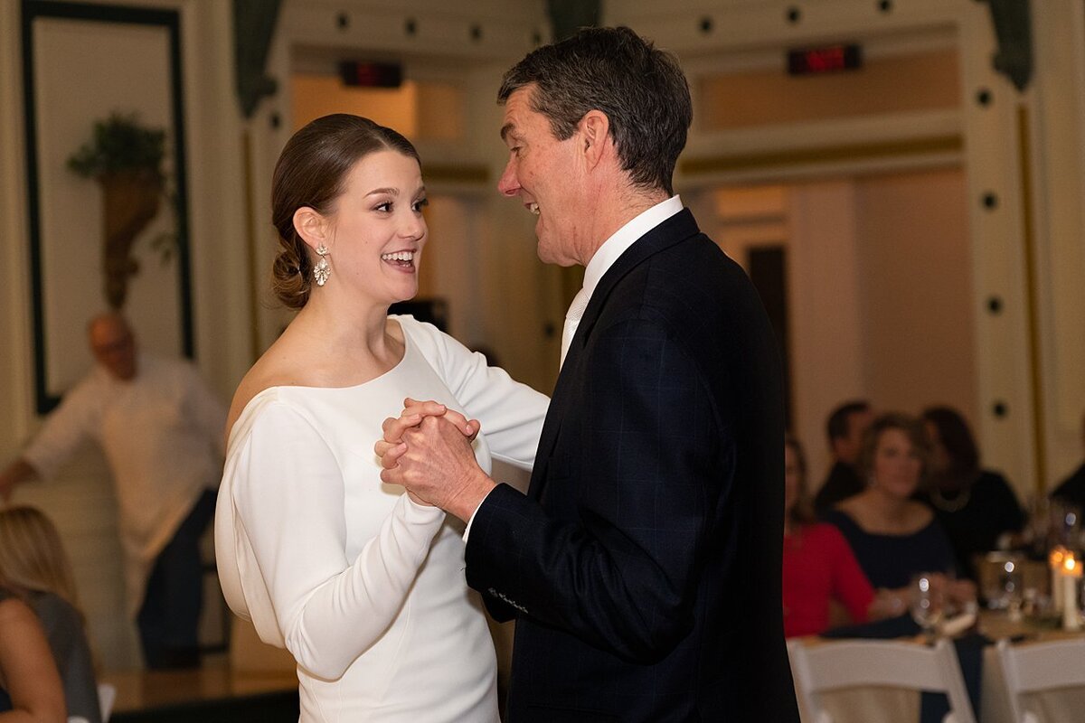 Bride and her Dad enjoy themselves during the Father Daughter dance during her wedding reception at Soldiers and Sailors Memorial Hall in Pittsburgh, PA