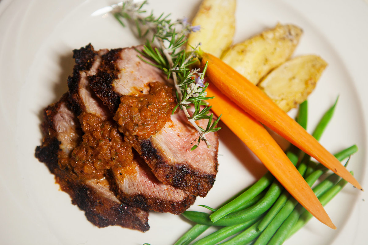 Grilled Tri-Tip Roast with fingerling potatoes, fresh seasonal vegetables, and smoked tomato salsa.