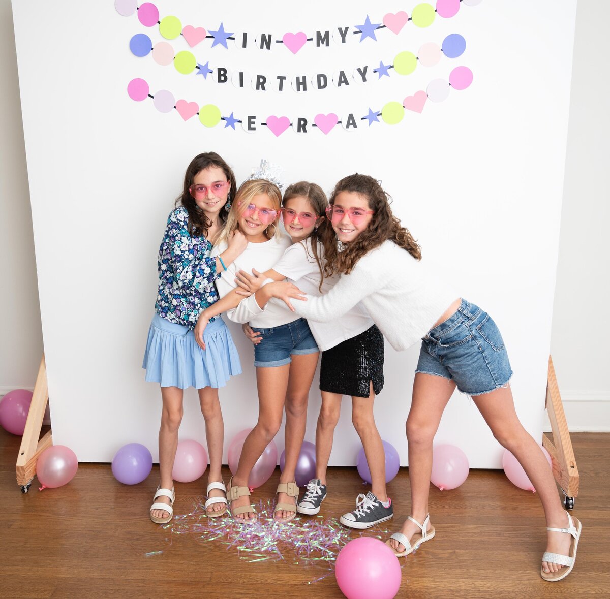 4 girls taking a selfie at taylor swift themed birthday party
