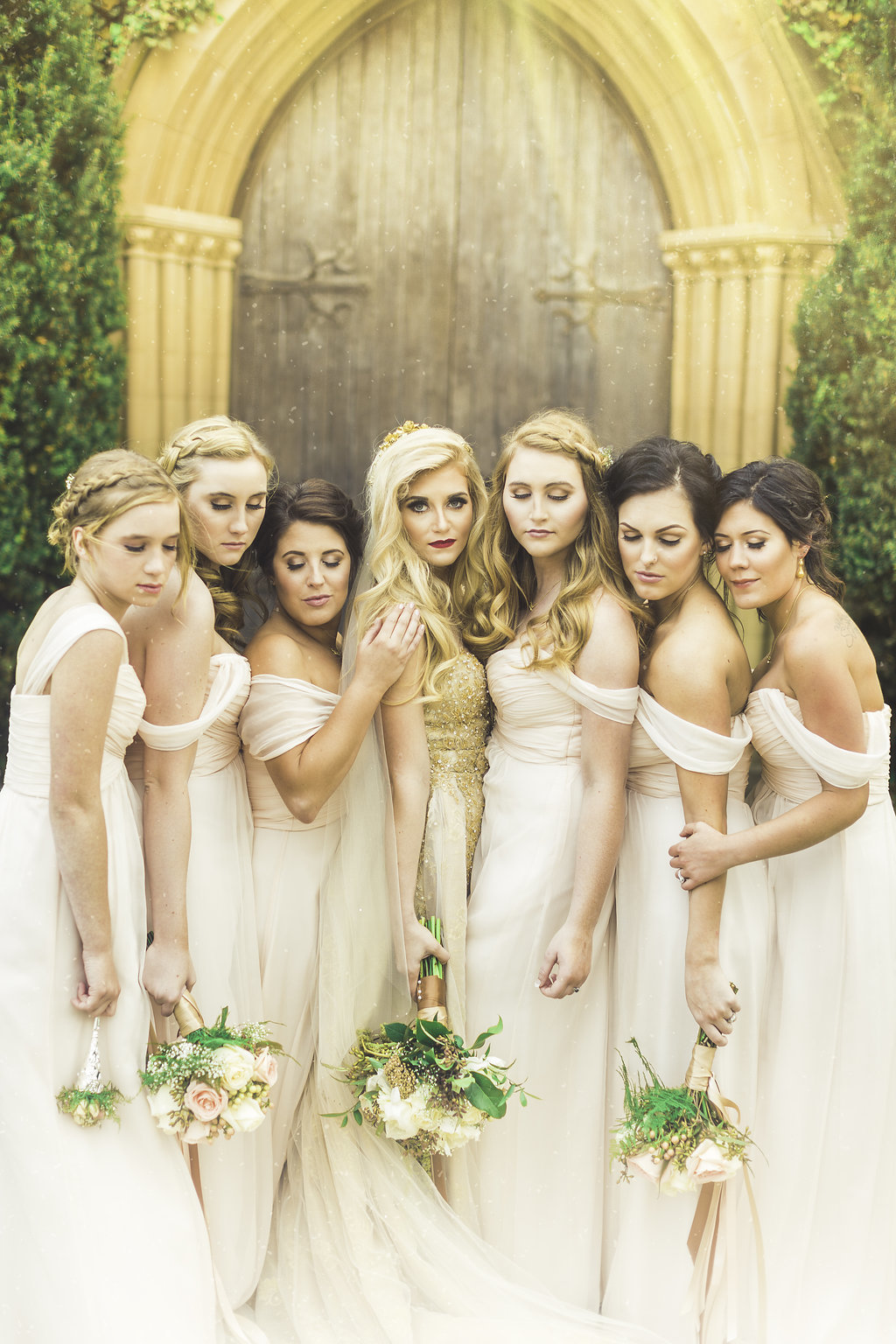 Wedding Photograph Of Bride and Bridesmaid Holding Each Other Los Angeles