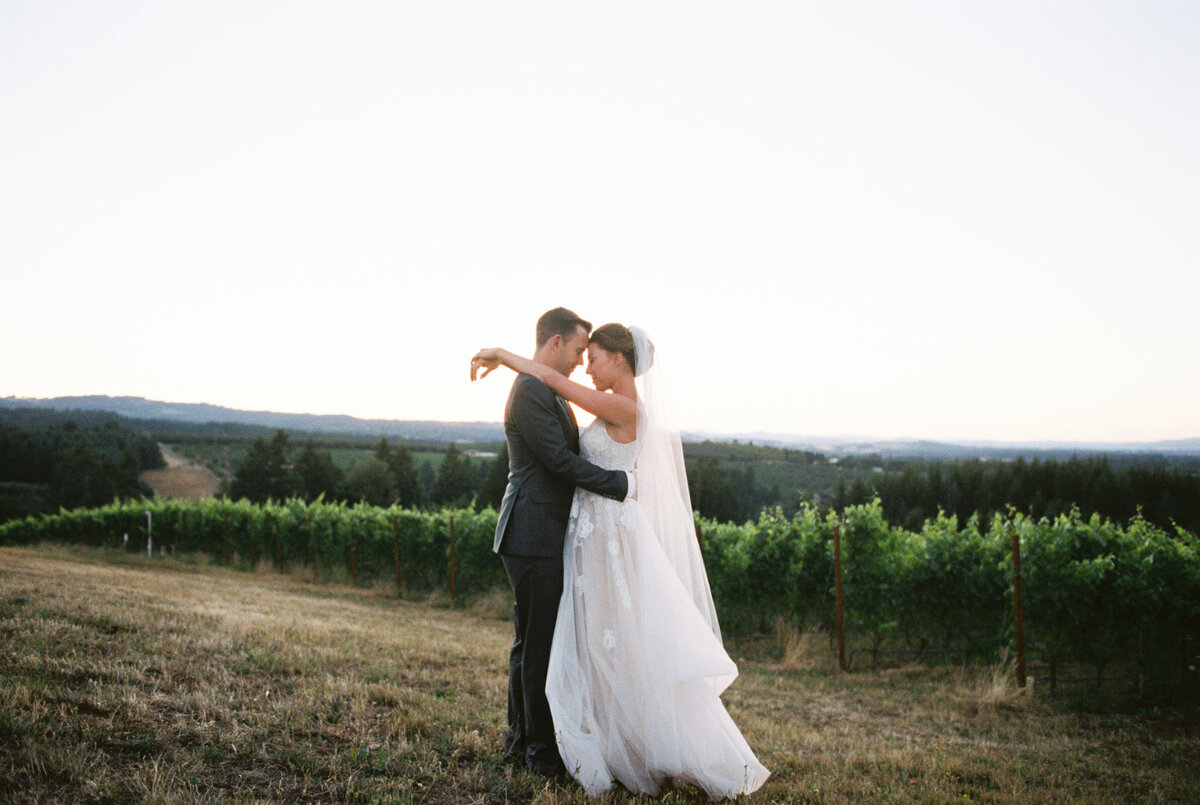 bride and groom dancing at ponzi vineyard winery