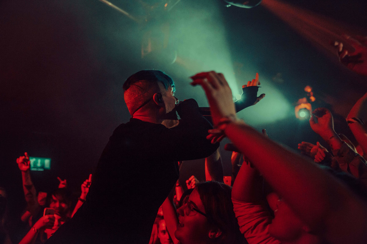 A shot from behind of Cody Carson, singer of Set It Off in the crowd at The Garage in London