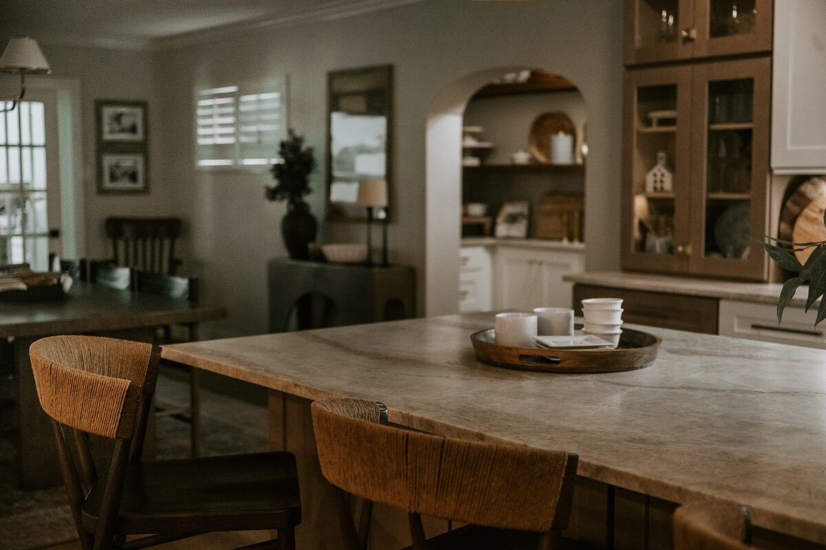 dewine design orlando interior design vintage cove trail kitchen island with arched pantry entryway