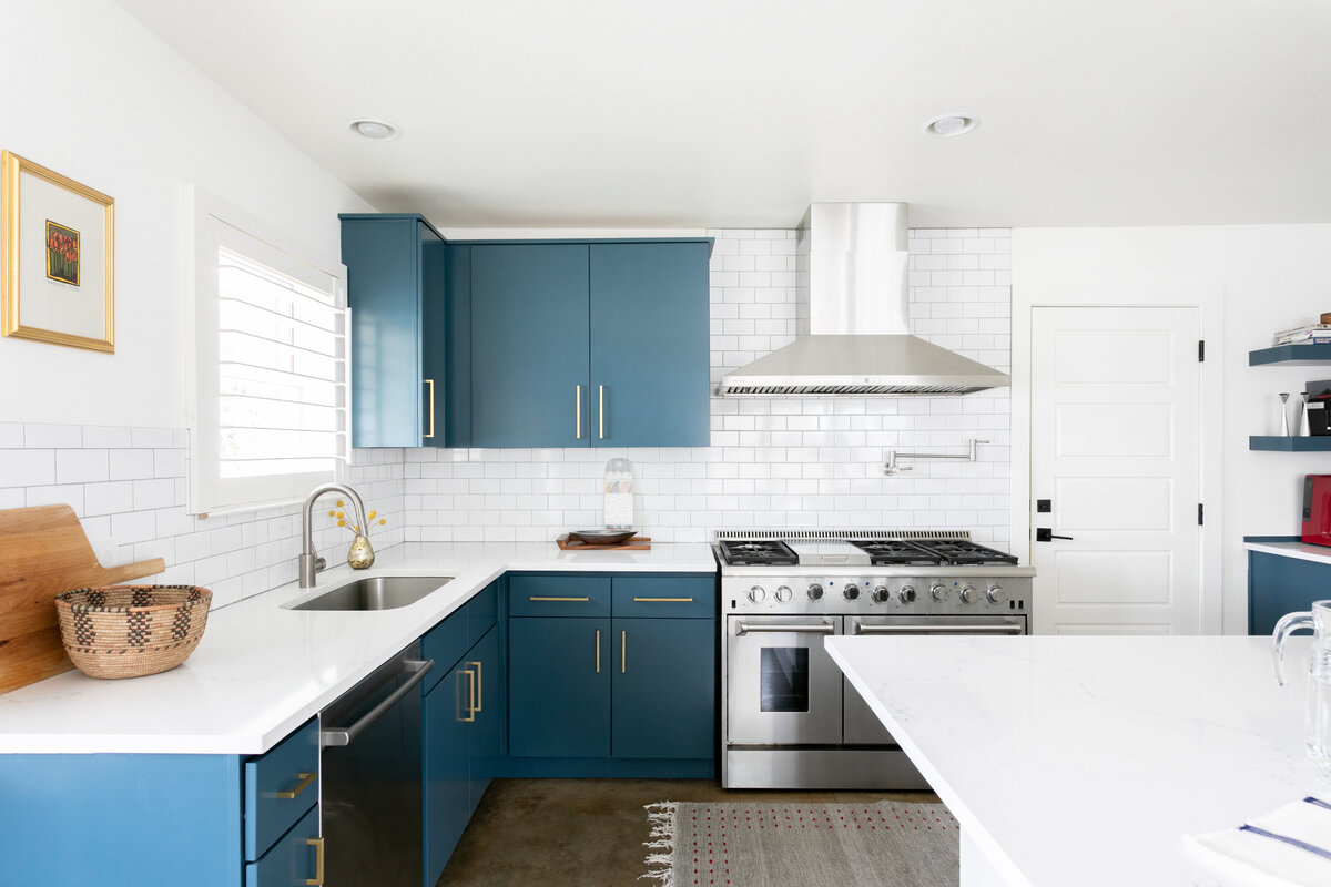 hello-home-austin-teal-kitchen-remodel-open-layout-semi-flush-pendants-l-shape-kitchen-stained-concrete-floors-5