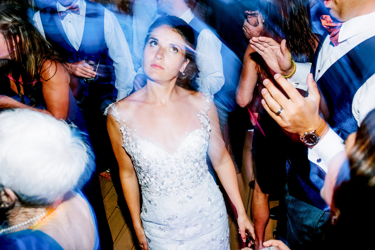 A bride has fun dancing at her Breckenridge, Colorado wedding