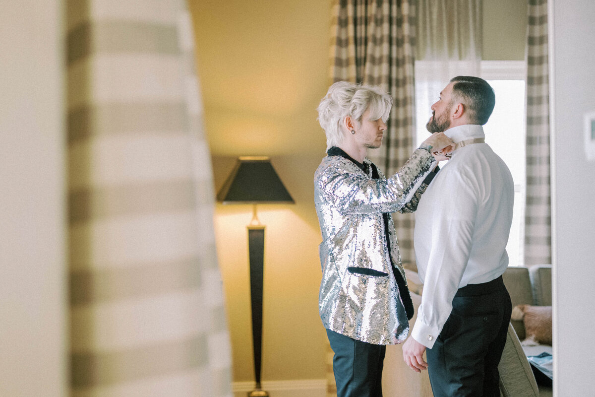 grooms-helping-eachother-get-ready