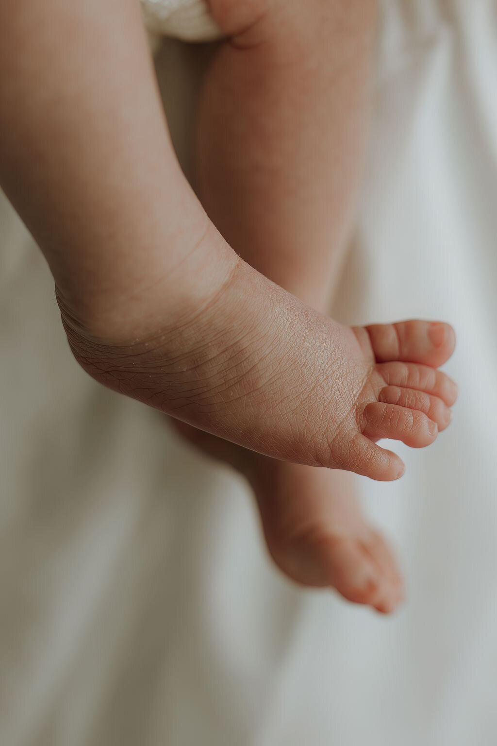 Closeup baby voetjes newborn fotoshoot
