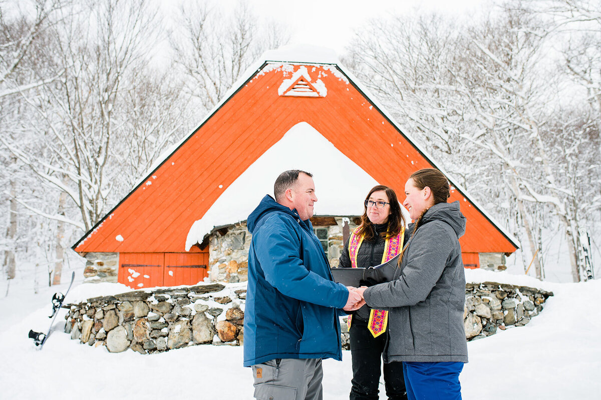 stowe mountain ski elopement ceremony at slopeside stone chapel in vermont
