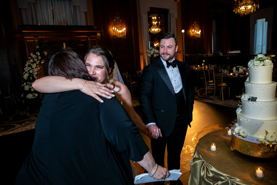 newlyweds-hug-planner-intercon-hotel-chicago-renaissance-ballroom