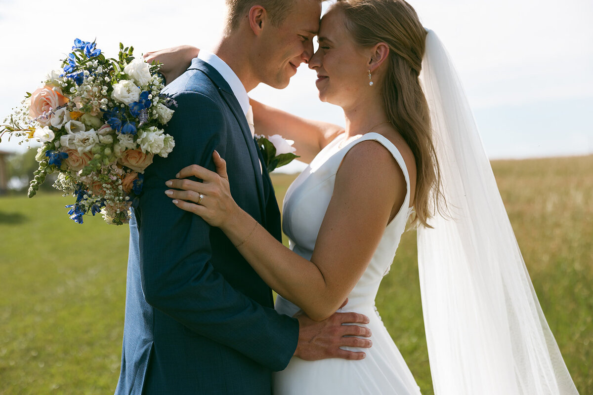 happy-bride-groom-in-love-wedding-portrait-in-field