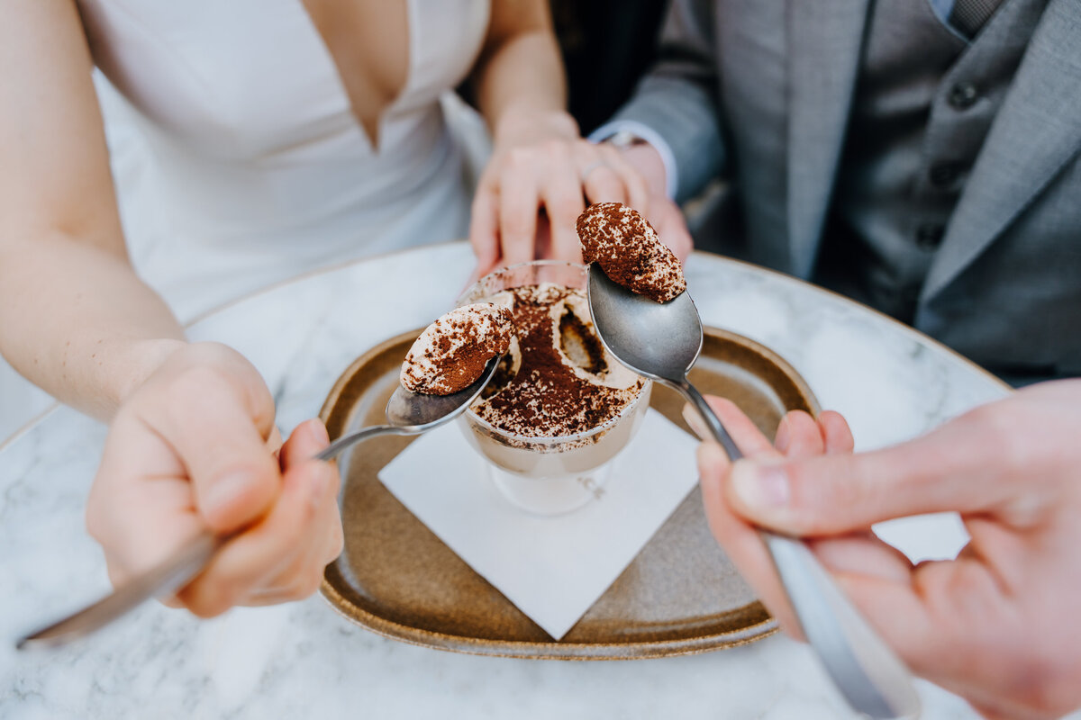 Intimate moment in a narrow Rome alleyway.
