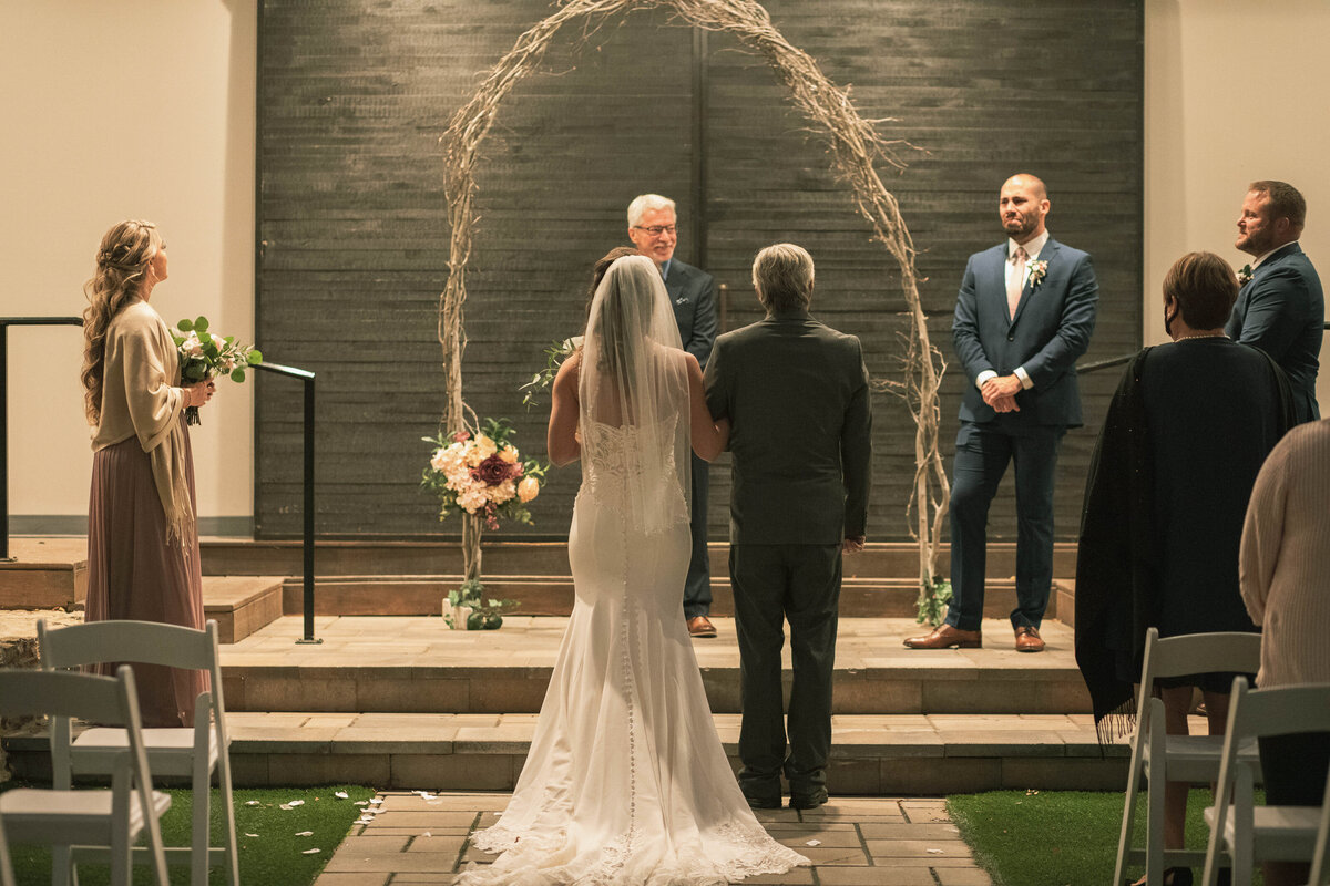 Bride-Groom-at-outdoor-alter