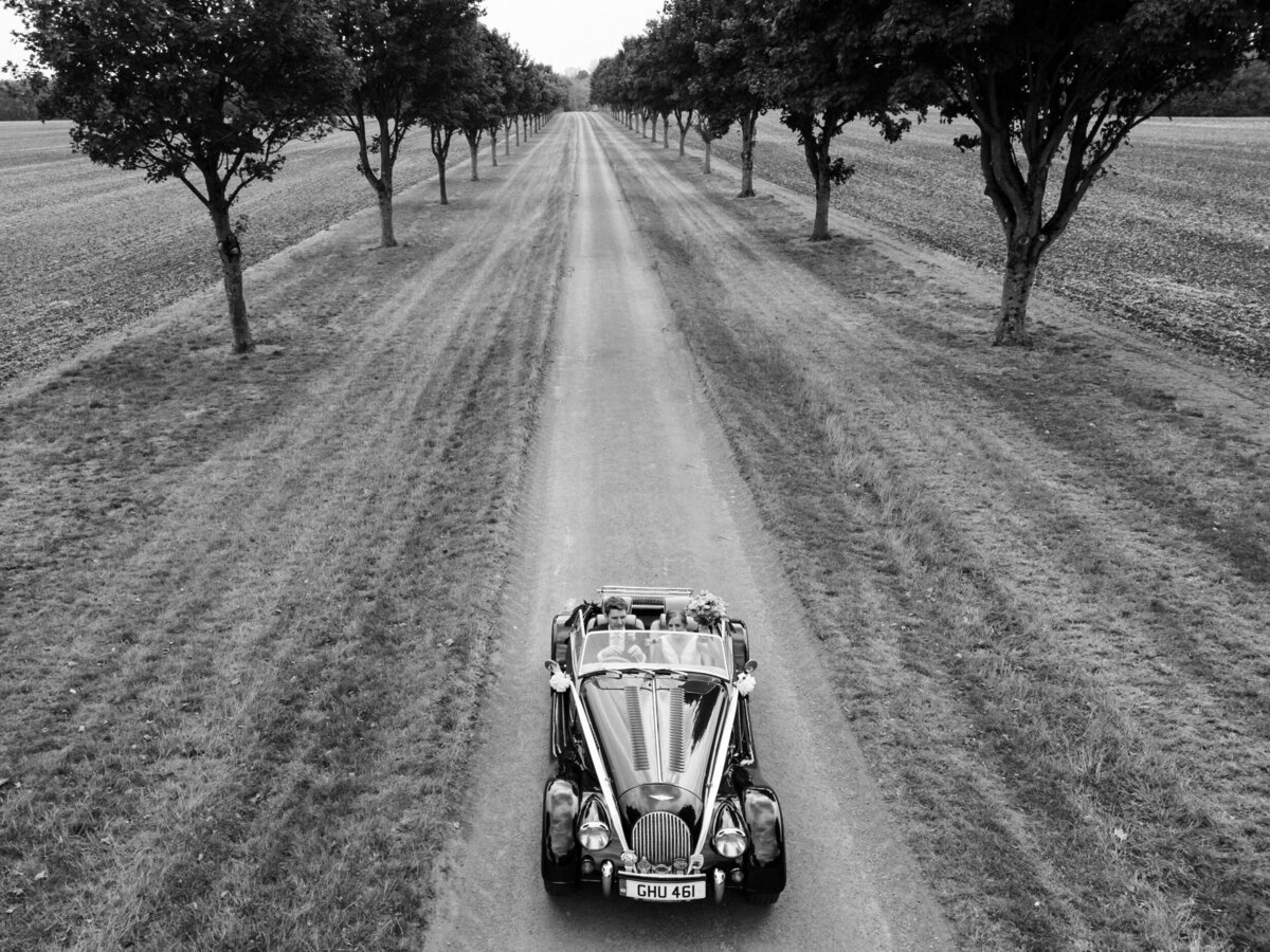 Wedding car shot from a drone in The Cotswolds