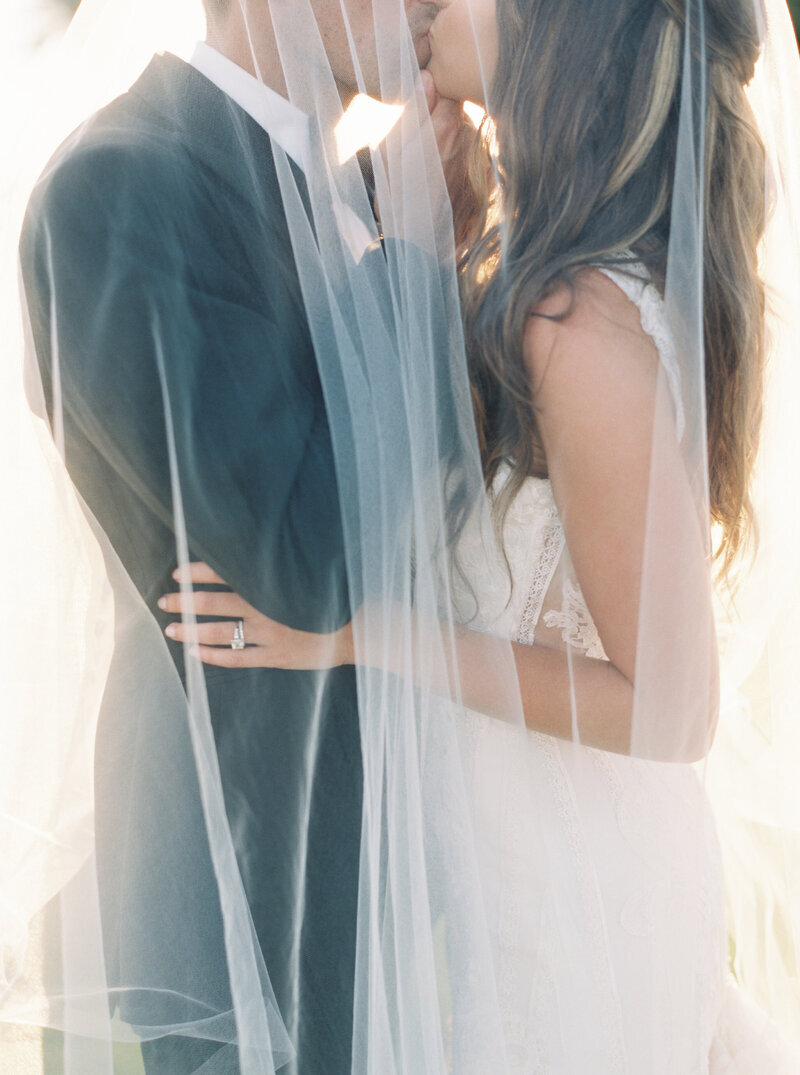 Miami wedding photo of a bride and groom kissing
