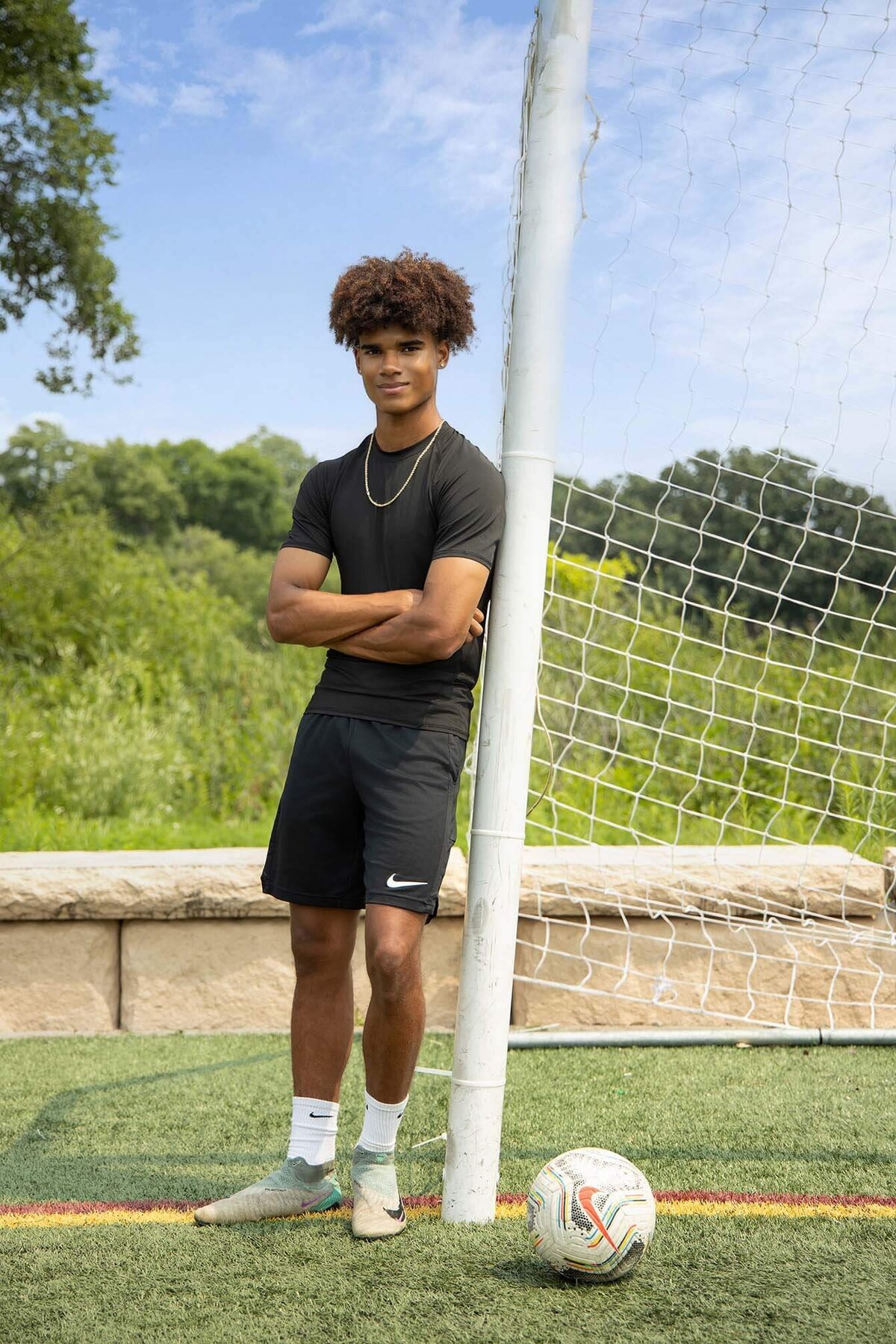 senior-guy-soccer-player-posed-by-goal