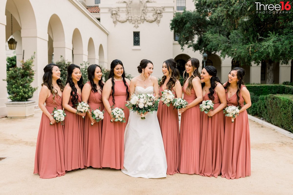 Bride and her Bridesmaids posing for photos