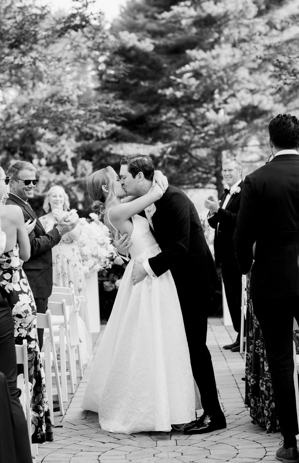 bride and groom kiss