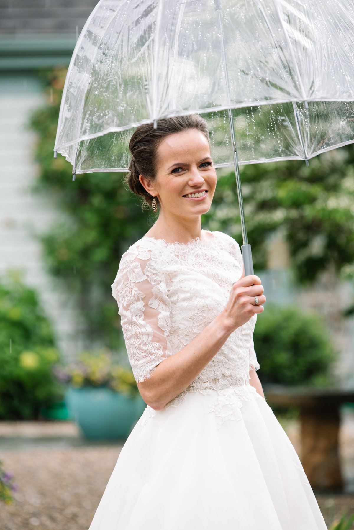 Bride with clear umbrella