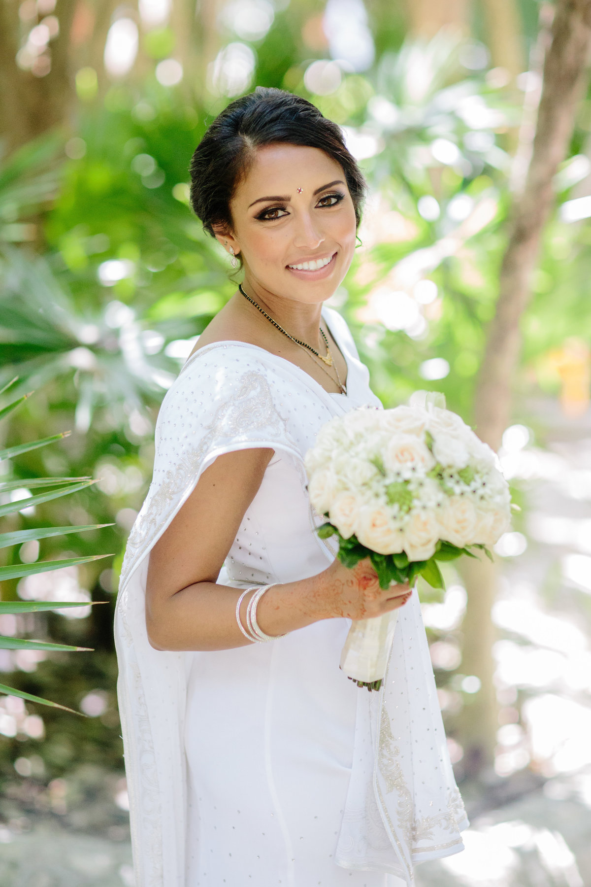 A multi day destination wedding in Mexico with Christian and Hindu influences, all set at the Hard Rock Riviera Maya.