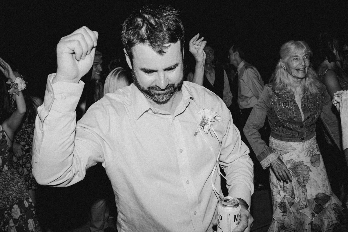 Wedding guests dancing at Umlauf Sculpture Garden, Austin