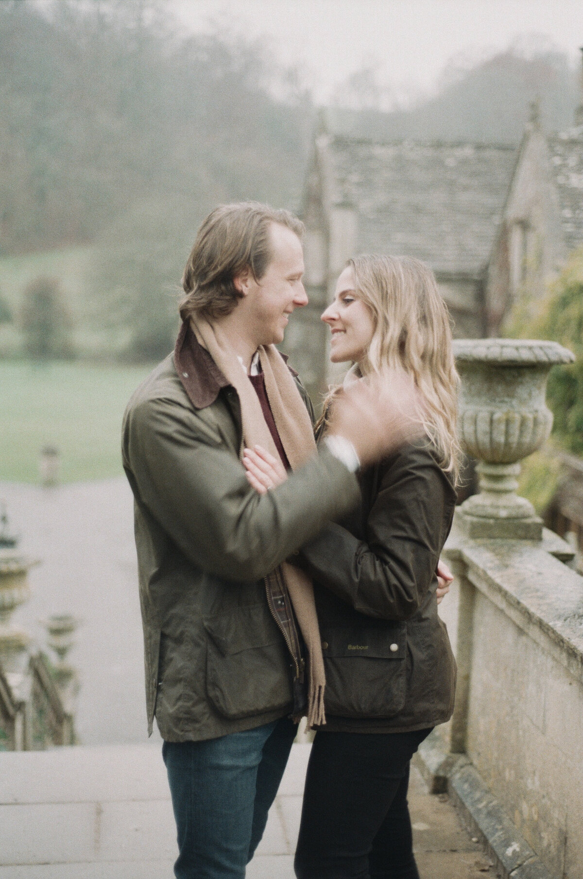 Engagement portraits in Castle Combe, Cotswolds captured on 35mm film