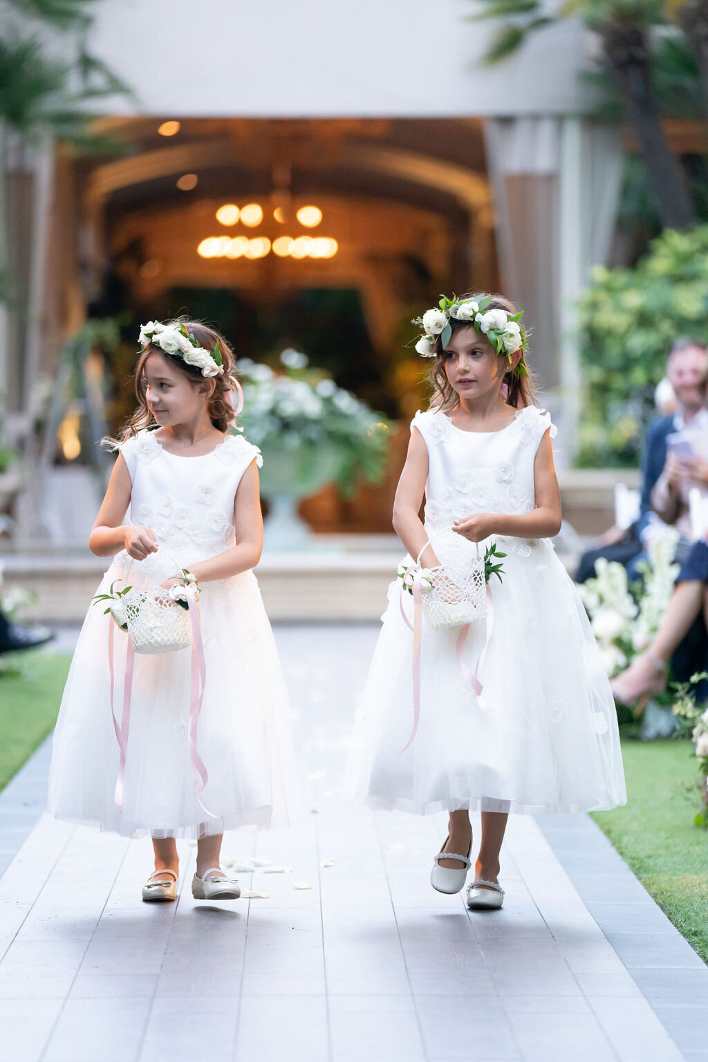 flower girls tossing petals