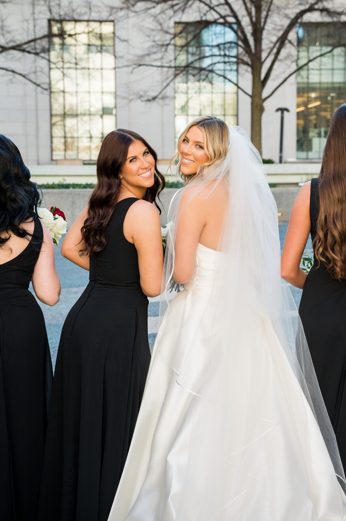 bride and maid of honor on wedding day